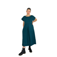 Load image into Gallery viewer, Martha dress pattern view A sleeveless in teal linen fabric on model - hand on hip, front view