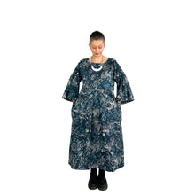 Load image into Gallery viewer, Martha dress pattern view A on model in navy and white floral double gauze - hands in pockets