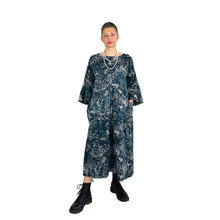Load image into Gallery viewer, Martha dress pattern view A on model in navy and white floral double gauze - hands in pockets