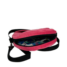 Load image into Gallery viewer, minnie bag sewing pattern by dhurata davies, open zipper view of the round bag in pink velvet fabric, showing the floral fabric lining and inside pocket