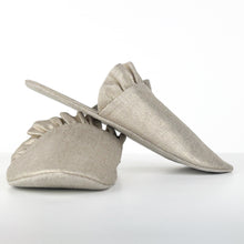 Load image into Gallery viewer, whisper slippers sewing pattern by dhurata davies, side view of the frilled version, made in gold printed linen fabric