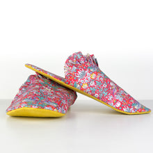 Load image into Gallery viewer, whisper slippers sewing pattern by dhurata davies, side view of the frilled version, made in liberty fabric, with yellow contrast linen