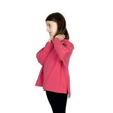 Load image into Gallery viewer, Side view of child model wearing Wren Pullover View B high neck pullover in pink.