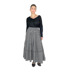 Load image into Gallery viewer, Ziggy Skirt sewing pattern by Dhurata Davies, front view with black and white stripes arranged in different directions