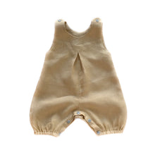 Load image into Gallery viewer, penny romper sewing pattern for babies and toddlers, by dhurata davies,  front view of the smallest size of the romper, made in a tan linen fabric