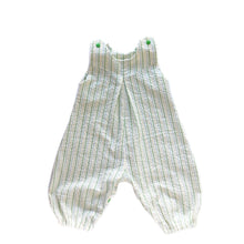 Load image into Gallery viewer, penny romper sewing pattern for babies and toddlers, by dhurata davies,  front view of the romper made in a striped white and green fabric with green snaps