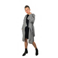 Load image into Gallery viewer, The Overlap sewing pattern by dhurata davies, front open view of the black and white long version, showing a detail of the hong kong bound facing