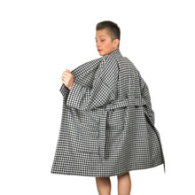 Load image into Gallery viewer, The Overlap sewing pattern by dhurata davies, back view of the black and white long version, held open
