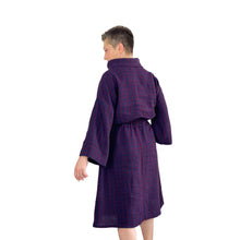 Load image into Gallery viewer, Edith sewing pattern – back view of mid-length linen dress with funnel neck, long wide sleeves, elasticated waist, straight hem, plum and navy checkered fabric