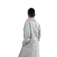 Load image into Gallery viewer, Edith sewing pattern – back view of top and skirt with hands in pockets, left side in focus