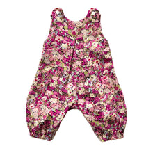 Load image into Gallery viewer, penny romper sewing pattern for babies and toddlers, by dhurata davies,  front view of the romper made in a pink white and green floral fabric