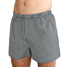 Load image into Gallery viewer, Man wearing the Hugo Boxers sewing pattern in black and white gingham, front view