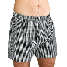 Load image into Gallery viewer, Man wearing the Hugo Boxers sewing pattern in black and white gingham, front view