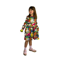 Load image into Gallery viewer, finished may pattern in liberty tana lawn fabric, little model turned slightly to her left, looking right, half eaten apple in hand